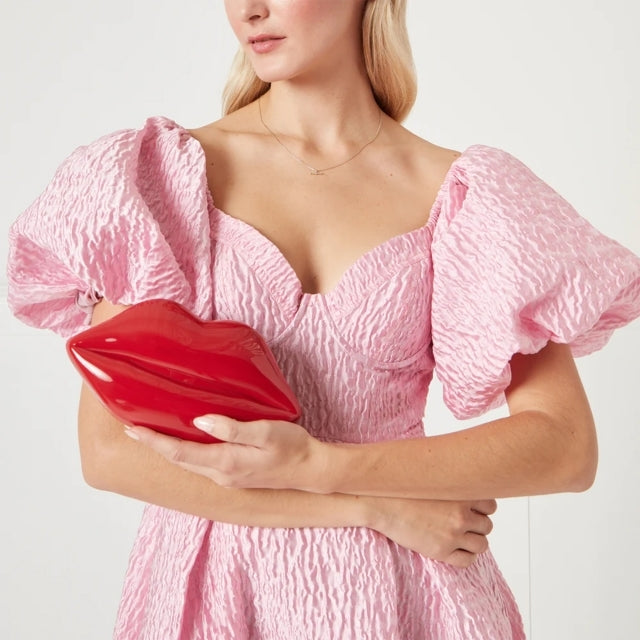 Discover Lulu Guinness and find out about her stunning luxury evening bags