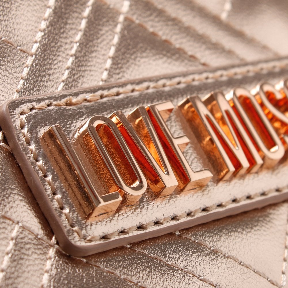 Quilted Rose Gold Clutch Bag