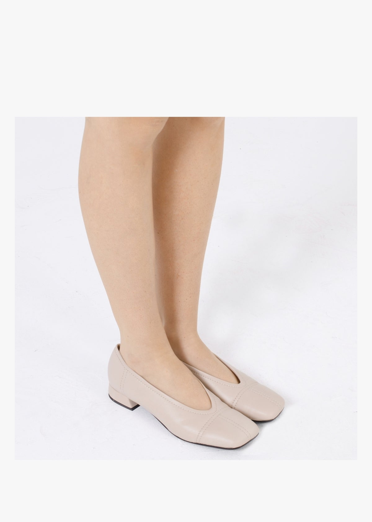 Angled Beige Leather Square Toe Pumps