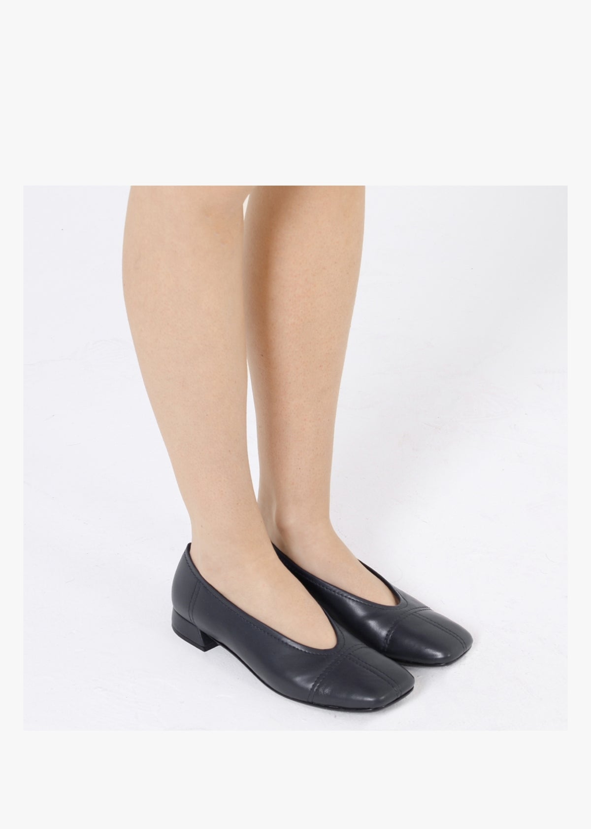 Angled Navy Leather Square Toe Pumps