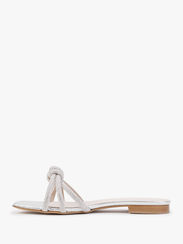 Flatante Silver Leather Twisted Diamante Mules