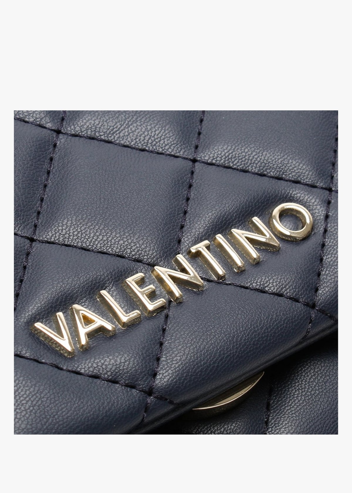 Ocarina Blue Quilted Cross-Body Bag