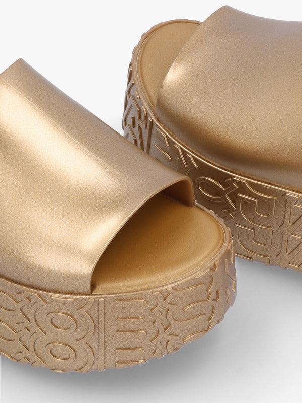 x Melissa Becky Gold Slab Sole Mules