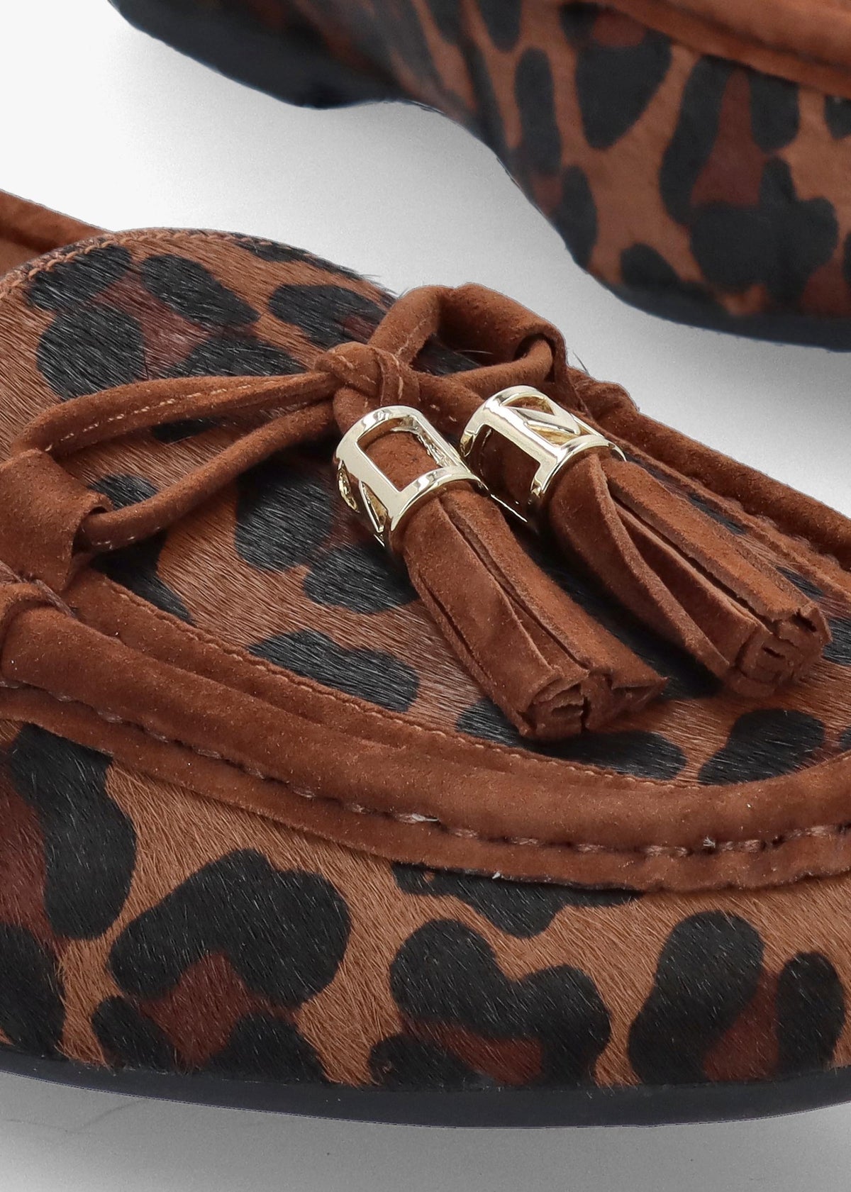 Famina Leopard Calf Hair Tassel Loafers