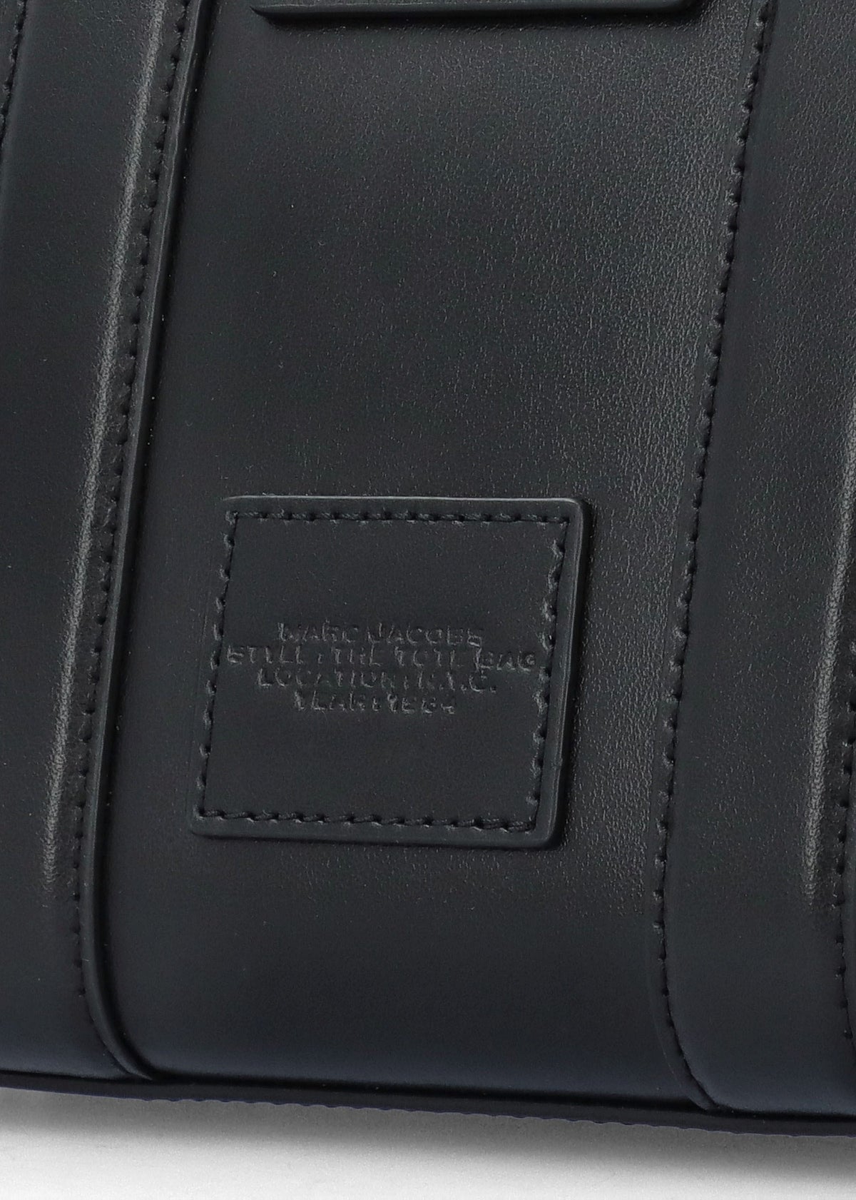The Turnlock Black Cross-Body Tote Bag