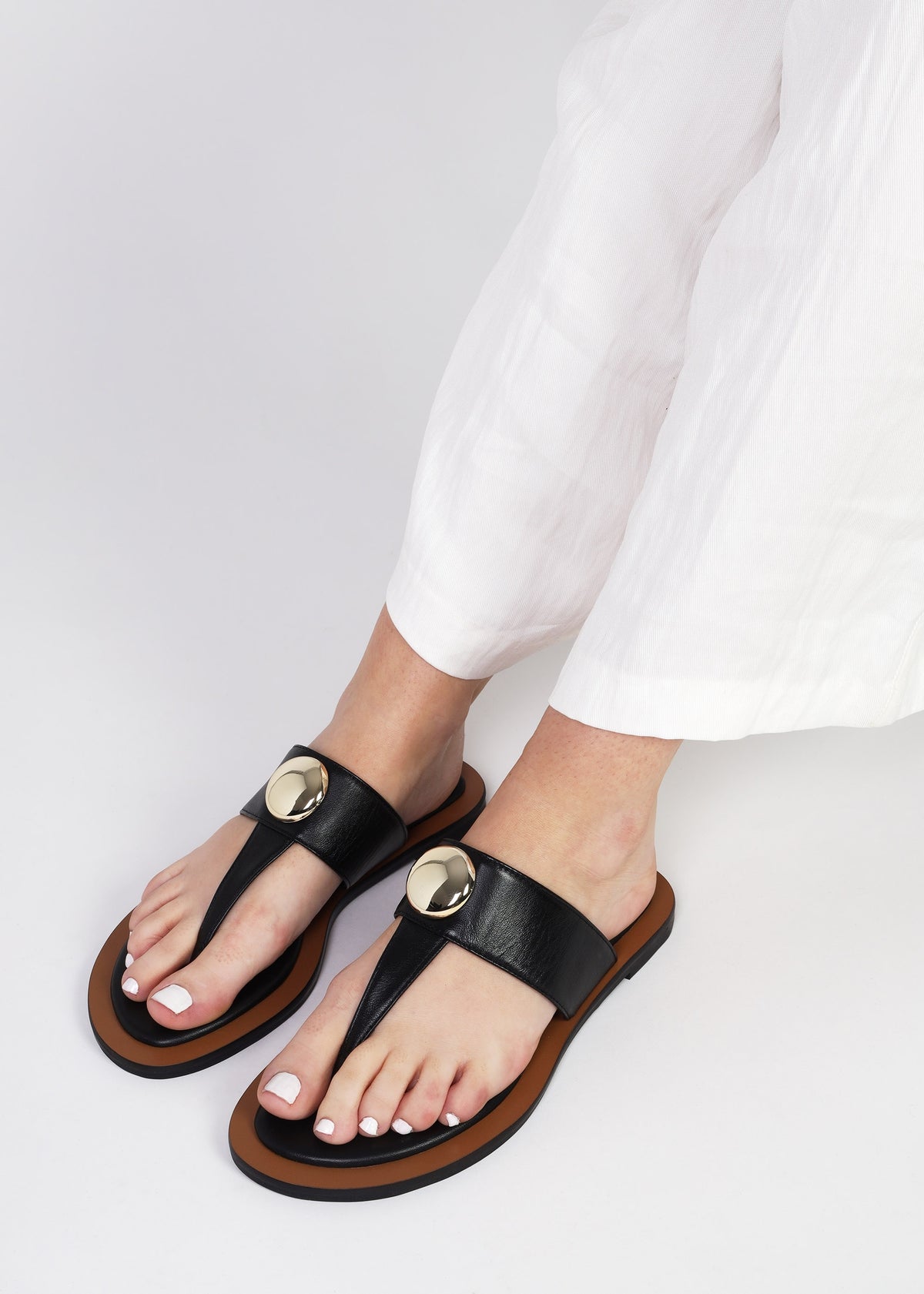 Costly Black Leather Toe Post Sandals