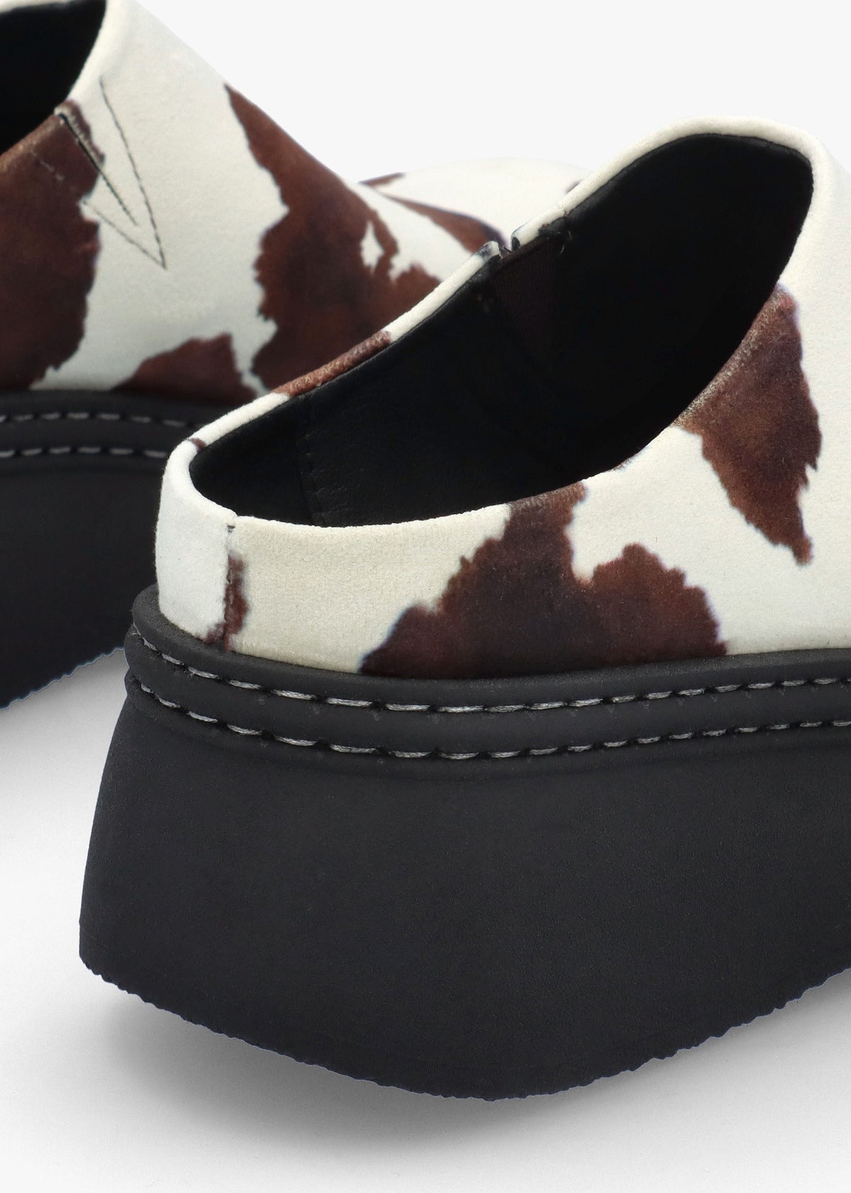 Kristi Cow Print Closed Toe Mules
