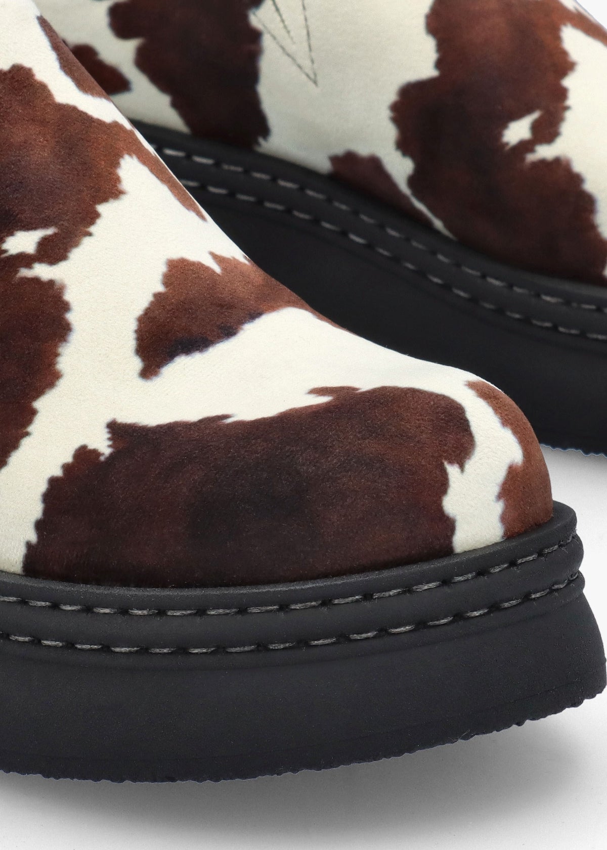 Kristi Cow Print Closed Toe Mules