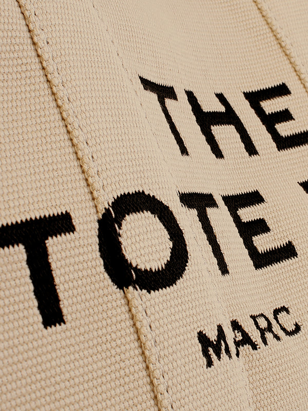 The Jacquard Medium Traveler Warm Sand Tote Bag