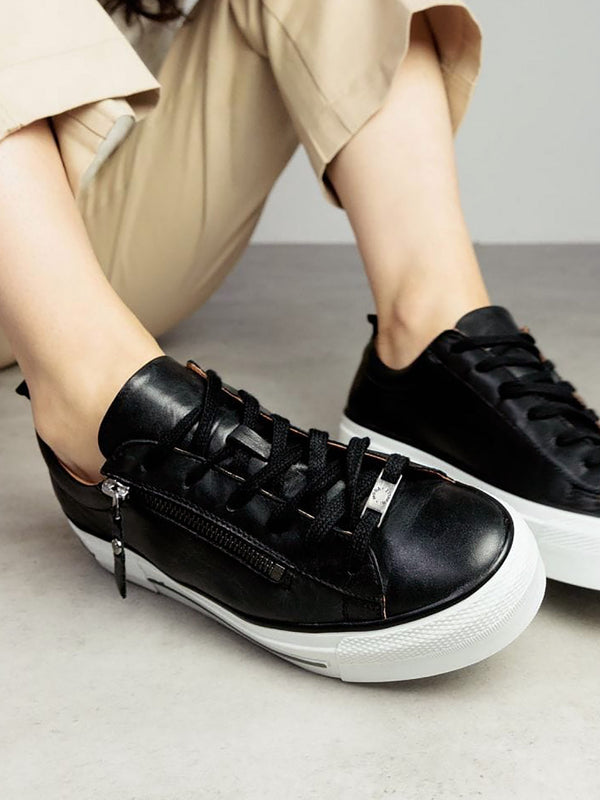 Filician Black Leather Side Zip Trainers