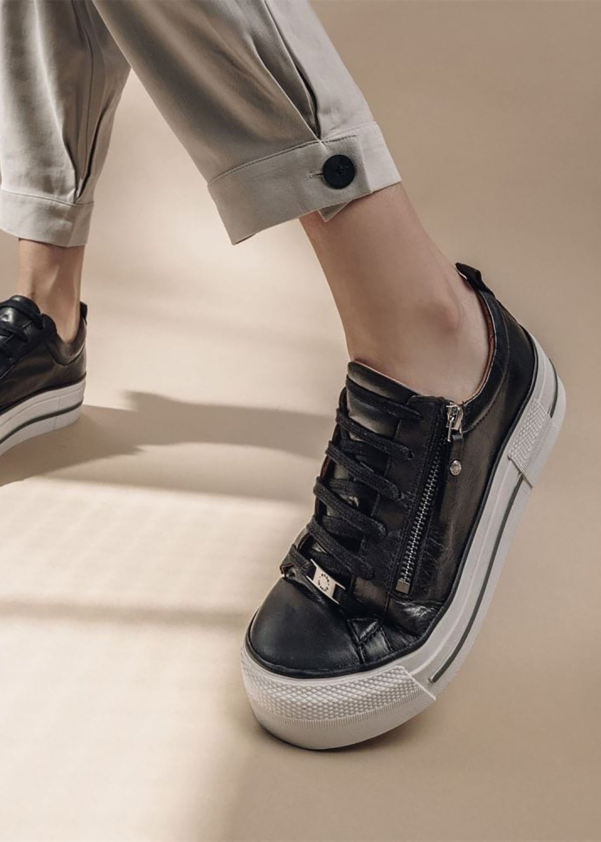 Filician Black Leather Side Zip Trainers