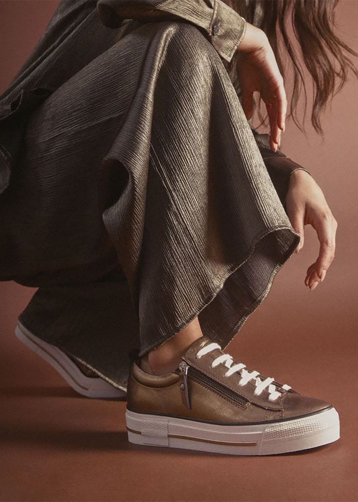 Filician Gold Leather Side Zip Trainers