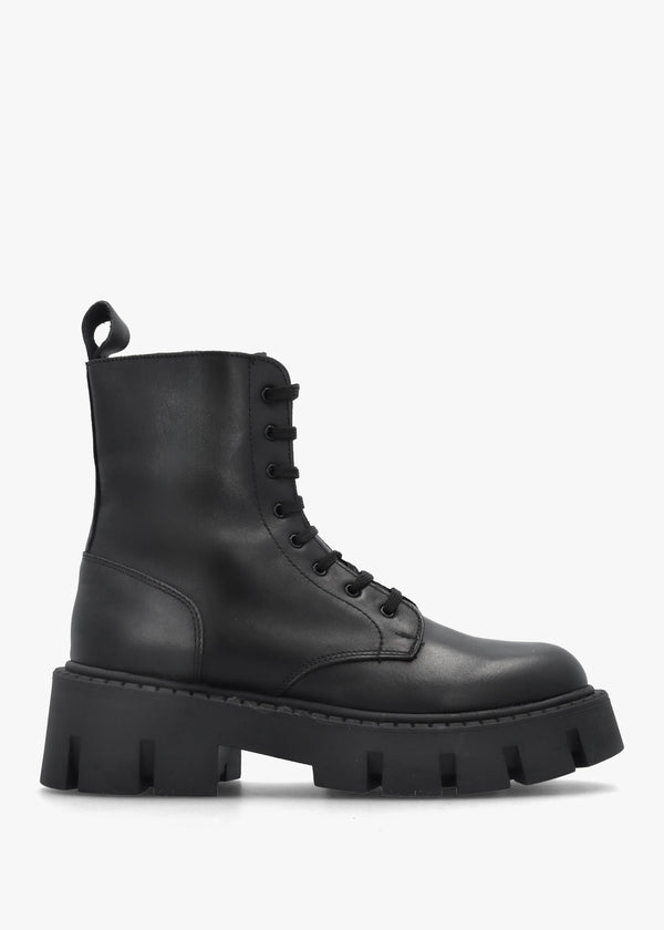 Black Leather Oversized Cleated Sole Ankle Boots
