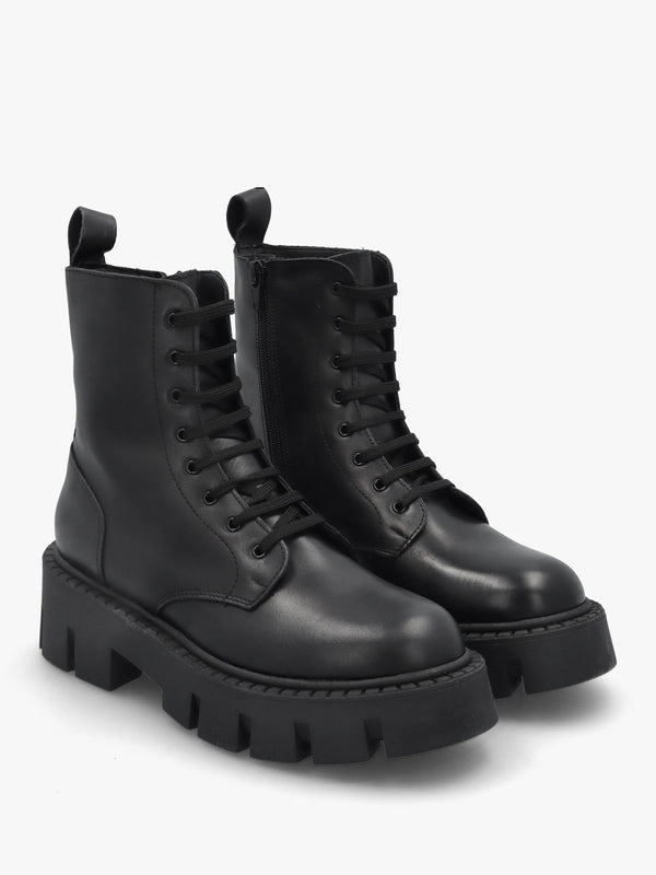 Black Leather Oversized Cleated Sole Ankle Boots
