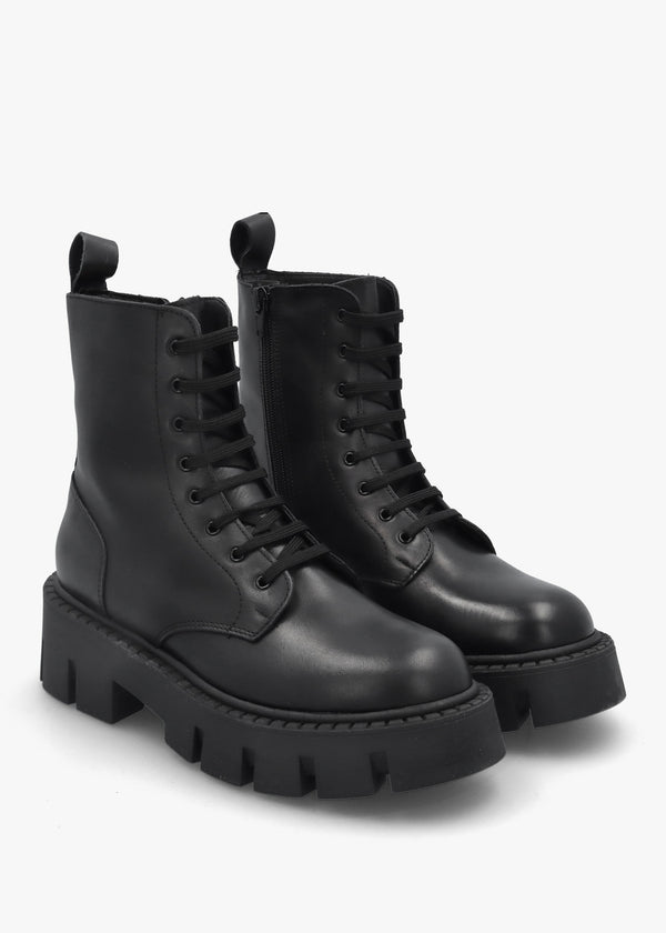Black Leather Oversized Cleated Sole Ankle Boots