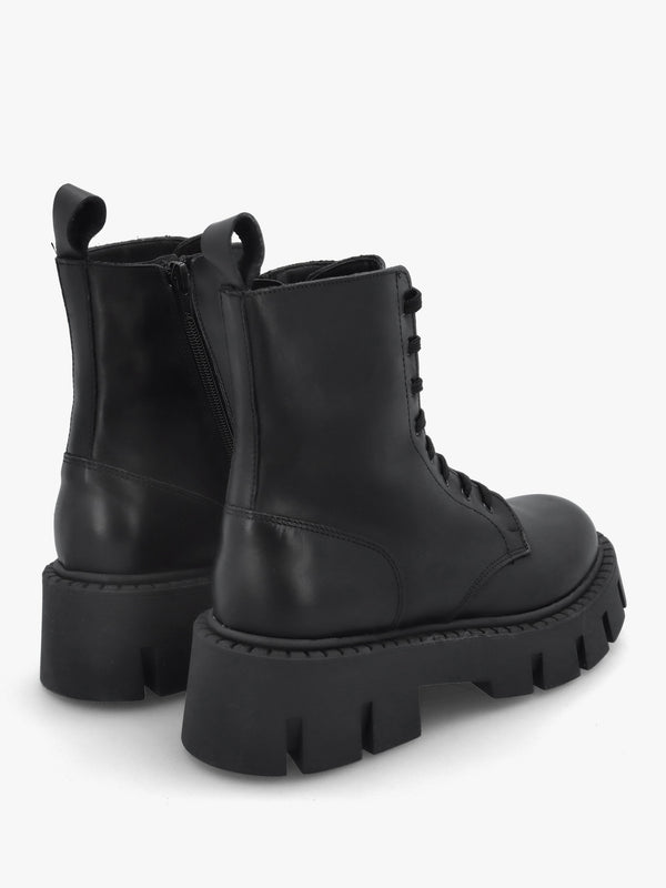 Black Leather Oversized Cleated Sole Ankle Boots