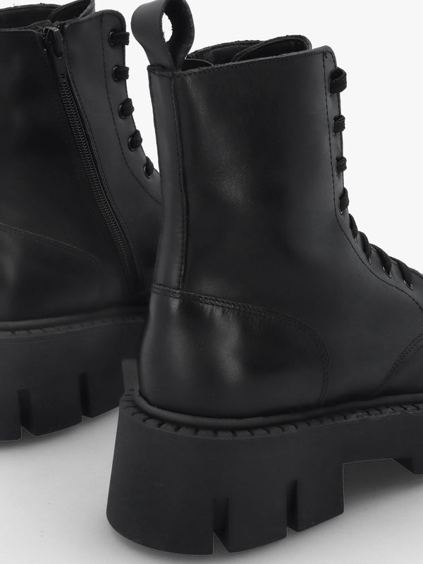 Black Leather Oversized Cleated Sole Ankle Boots