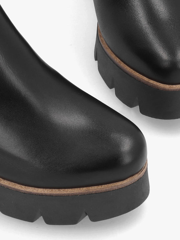 Alpaca Black Leather Wedge Ankle Boots