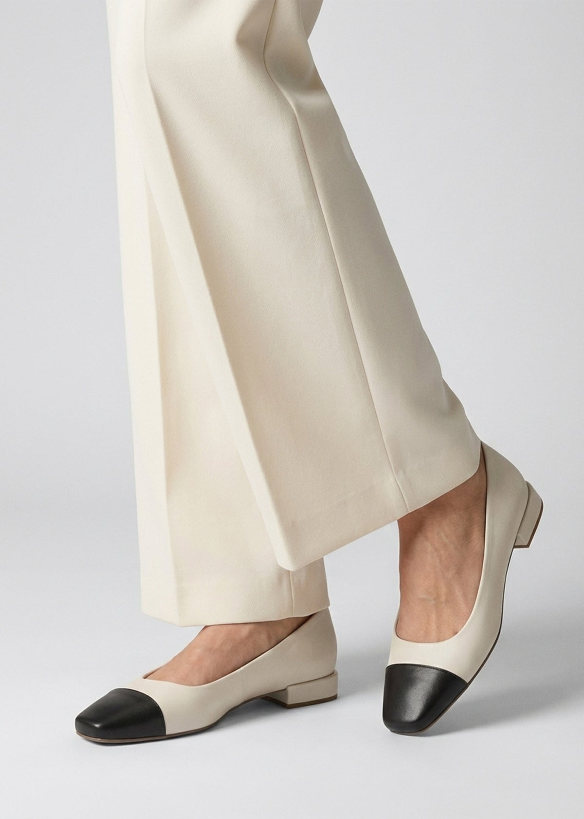 Saria White & Black Leather Toe Cap Pumps