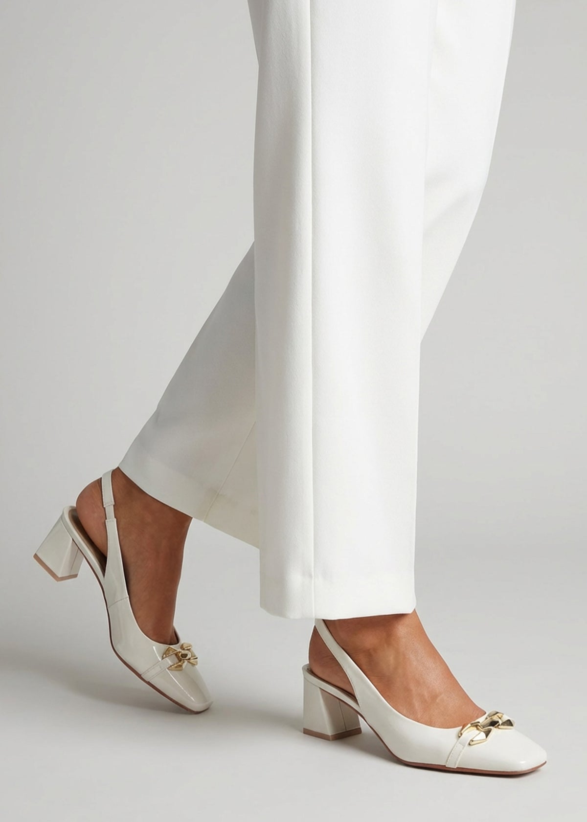 Sachay Cream Patent Leather Sling Back Court Shoes