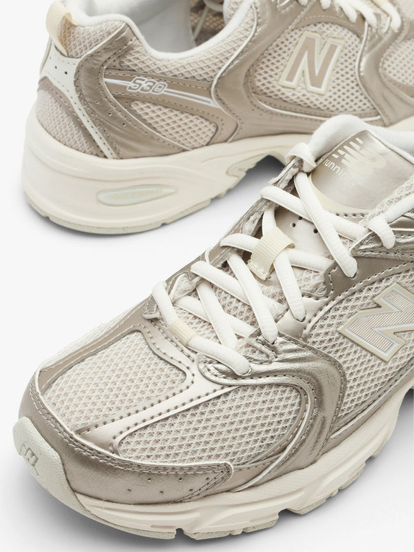 New Balance Women’s 530 Gold Metallic With Reflections Trainers