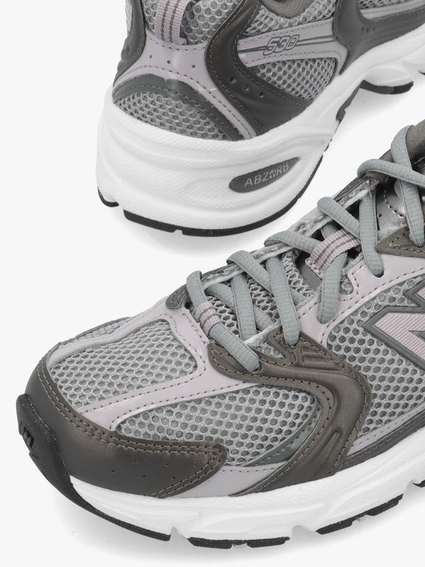 New Balance Women’s 530 Black Metallic Truffle Salt Trainers
