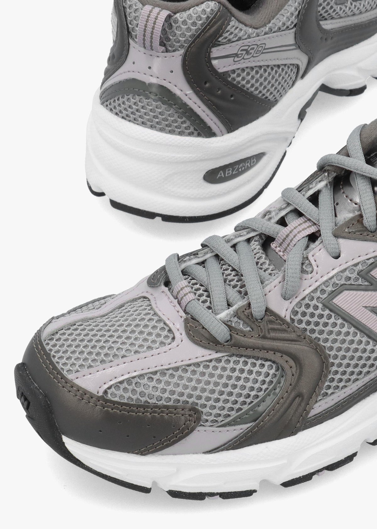New Balance Women’s 530 Black Metallic Truffle Salt Trainers